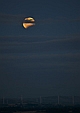 Częściowe zaćmienie Księżyca. Zdjęcie wykonane z góry Przylaski w Zręcinie. W dole elektrownia wiatrowa w Rymanowie.2017.08.07.20:21CWE 