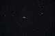 Ostatnio odwiedziłem starą, dobrą przyjaciółkę - galaktykę M-104 Sombrero. Fotony światła, które wpadły do teleskopu i bombardując matryce aparatu utworzyły jej obraz pochodzą sprzed 45 milionów lat. Tyle bowiem potrzebują czasu na dotarcie z tej odległej wyspy Wszechświata . Sombrero jest prawdziwym olbrzymem wśród galaktyk. Składa się z około biliona gwiazd a w jej centrum rezyduje czarna dziura o monstrualnej masie równej 1 miliardowi mas Słońca. Parametry: 2018.03.22-23.22:19-00:04CSE.Newton 250/1520+MPCC+N.D810.Exp.3x240sek.,3x120sek. ISO1600.  