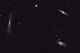 Triplet Lwa, mała grupa galaktyk i jeden z klasycznych tematów astrofotograficznych. Tworzą go M-66,(w prawej dolnej części zdjęcia) - która jest galaktyką spiralną z poprzeczką. M-65,(w prawej górnej części) - galaktyka spiralna i NGC- 3628,(w lewej części fotografii) - galaktyka spiralna ze zdeformowanym dyskiem, za co prawdopodobnie odpowiadają siły grawitacyjne jej dwóch sąsiadek. Światło Tripletu potrzebuje około 35 milionów lat, by dotrzeć do naszych teleskopów. Parametry: 2014.03.01-02.22:17-00:05CSE. Reflektor Newtona 250/1520 + Nikon D300, w ognisku głównym. 
Exp.18x240sek.ISO1600.